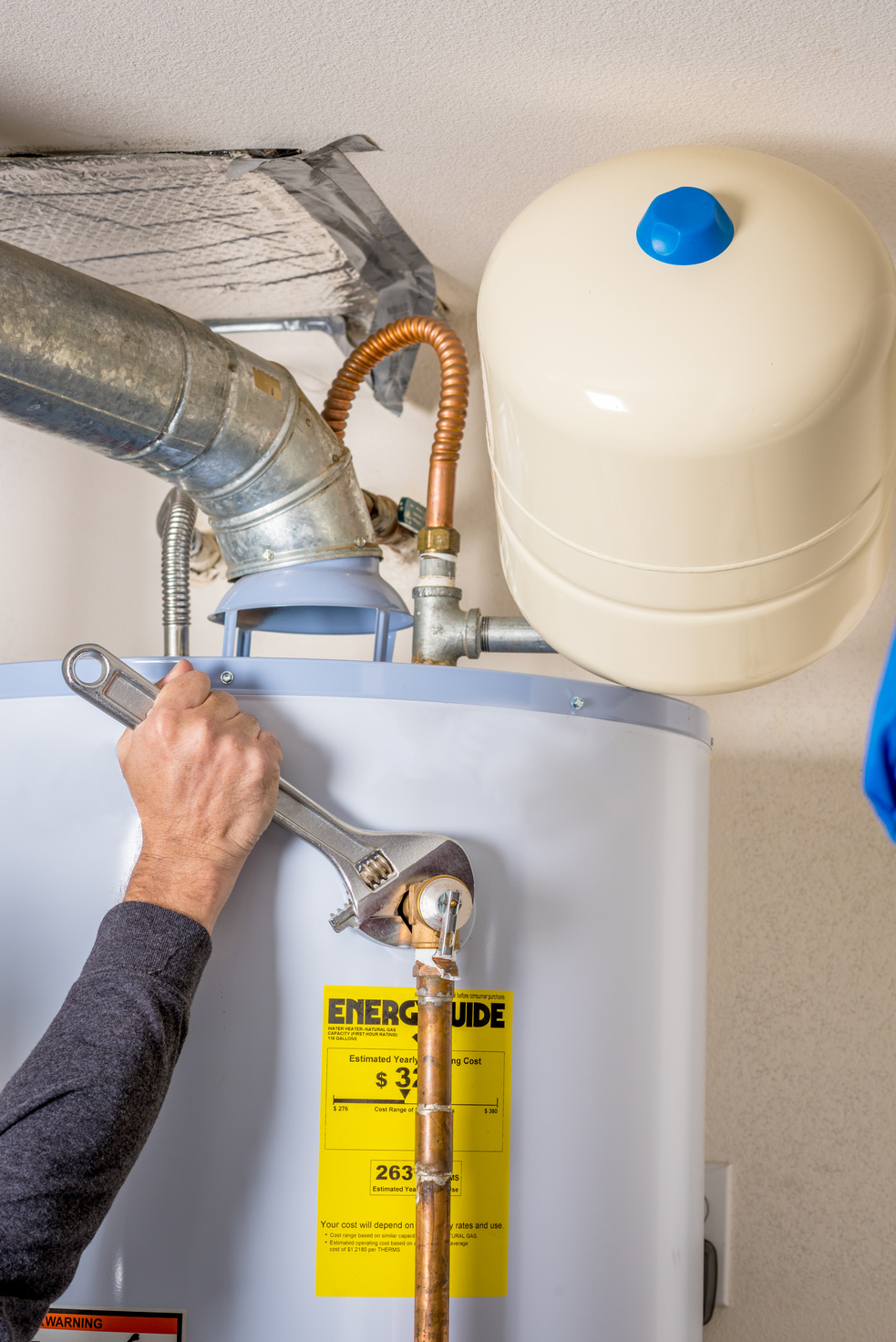 Hot water heater maintenance with a wrench